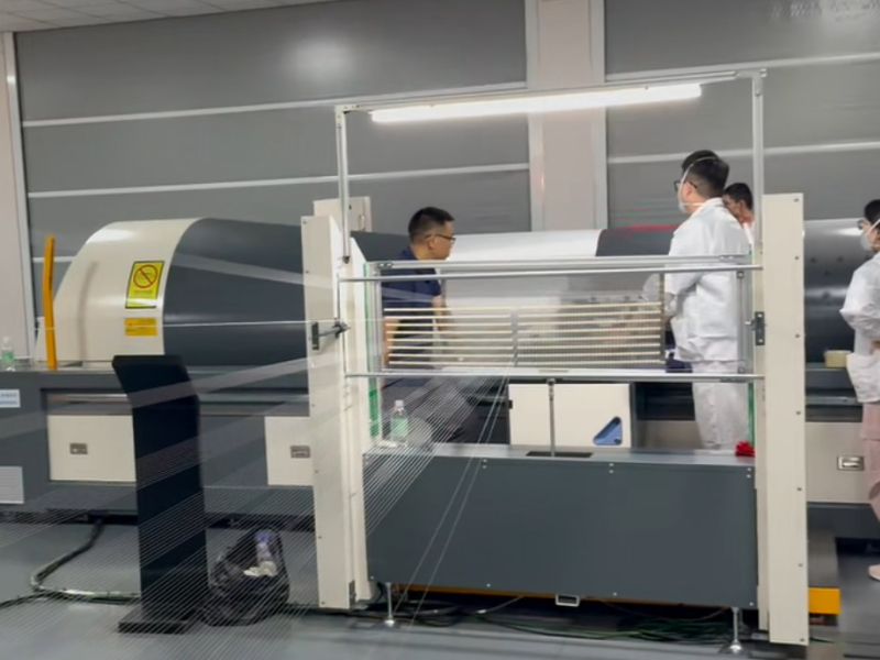 Which warping machine can stand the test for challenging glass fiber yarn processing?